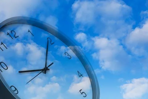 Time concept. Clock and blue sky with fluffy clouds, double exposure Illustrazione stock