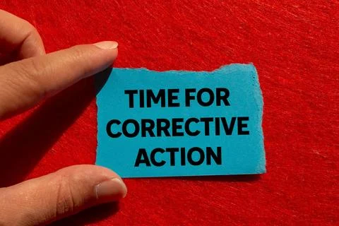 Time for corrective action message written on ripped torn blue paper on red.. Stock Photos
