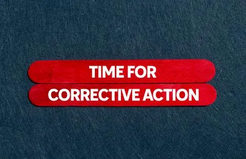 Time for corrective action message written on red wooden sticks on gray bac.. Stock Photos
