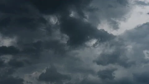 Time delay photography of dark clouds floating in dark sky 스톡 동영상 154342291