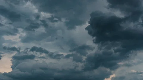 Time delay photography of dark clouds floating in overcast weather Stock Footage 154343784