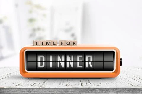 Time for dinner message on a wooden table Stock Photos