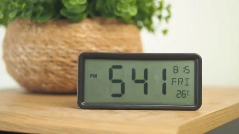 Time display showing digital clock and temperature readings Stock Footage 318998362