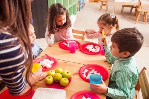 Time to eat in kindergarten Stock Photos