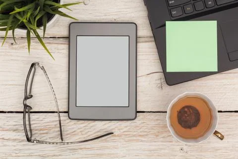 Time for the ebook with tea Stock Photos