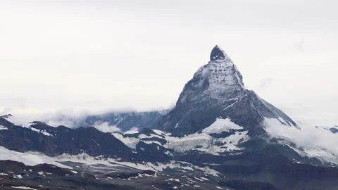 Time elapse of cloudy Matterhorn mountain in Zermatt Switzerland after rainfa Stock Footage 137514595