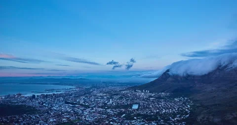 Time elapse of rolling clouds over mountain at dusk,Cape Town,South Africa Stock Footage 140578202