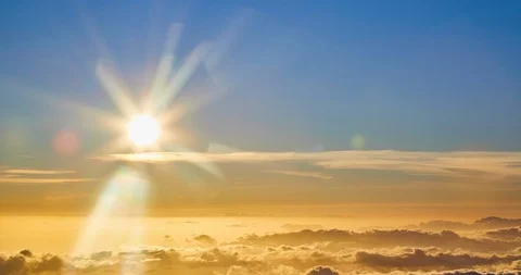 Time Elapse of setting sun above moving clouds at Haleakala Crater Summit Stock Footage 114932010