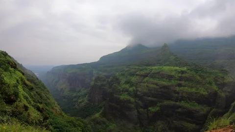 Time elapse of a valley with clouds moving around Video stock 95591242