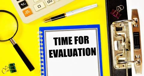 Time for evaluation. A text label in the planning notebook. Stock Photos