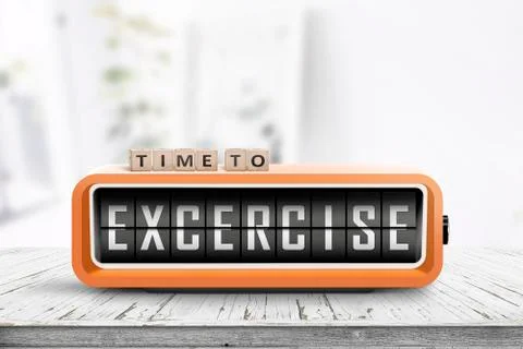 Time to excercise message on an alarm clock Stock Photos