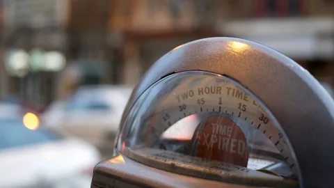 Time expired parking meter indication sign near urban area Stock Footage 105551750