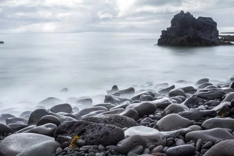 Time exposure of stony beach at Hellnar, Snaefellsnes National Park Stock Photos