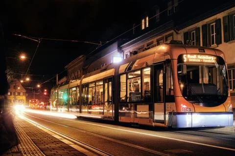 Time Exposure train traffic light night Mannheim street urban public transpor Stock Photos