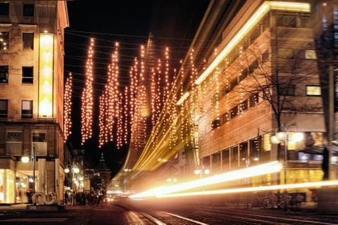 Time Exposure train traffic light night Mannheim street urban public transpor Stock Photos