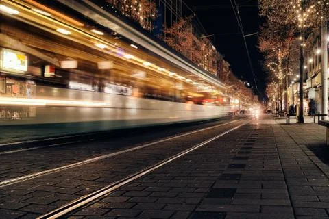Time Exposure train traffic light night Mannheim street urban public transpor Stock Photos