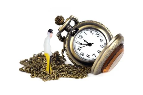 Time flies fast concept. Small old man in front of a big antique pocket watch. 스톡 사진