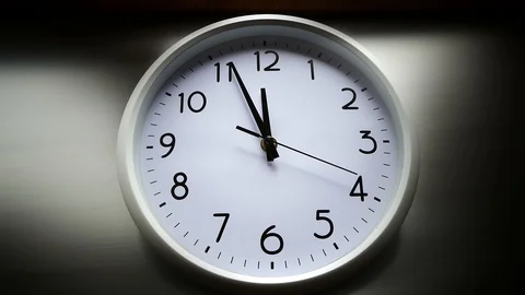 Time goes back. Clock close-up. Hour minute and second hand. Wall clock Video stock 117529886