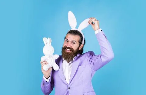 Time for having fun. true gentleman with bunny ears. male funny look. bearded Stock Photos