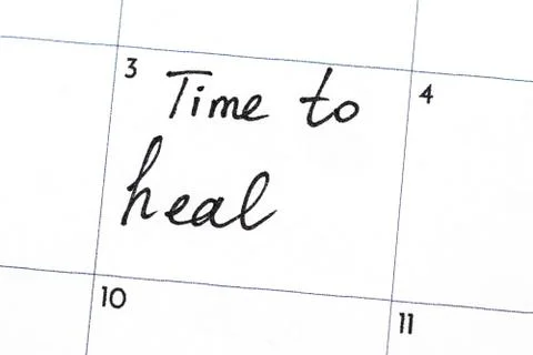 "time to heal" text write on calendar Stock Photos