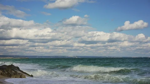 Time interval. 4k. White clouds over the sea. Stock Footage 118444592