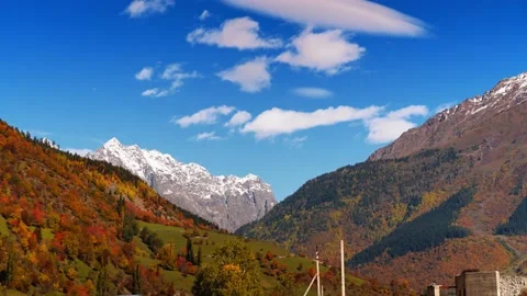 The time interval of clouds moving over the mountains in autumn Vídeo Stock 166633259