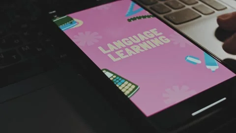 Time to Language learning graphic presentation on mobile phone screen. Education Stock Footage 270496659