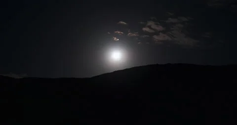 Time lapce night clouds and full moon rises over top of mountain. 4k UHD Stock Footage 146452155