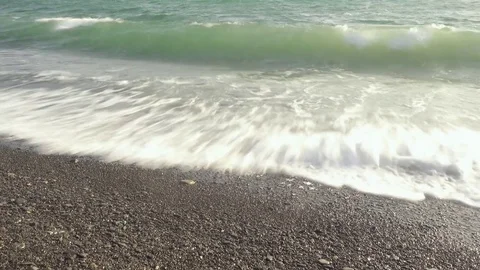 Time-laps azure sea wave creeps on shore Stock Footage 82384915