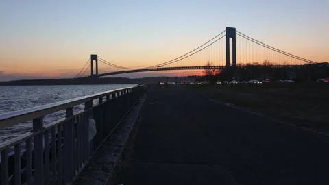 Time laps in Brooklyn with traffic and Verrazzano bridge Stock Footage 242059143