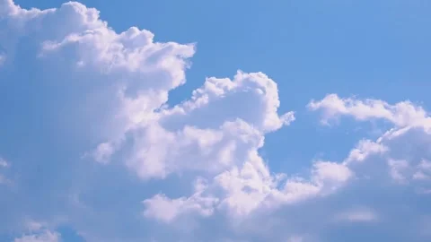Time laps. Clouds in blue skies in sunny weather Stock Footage 157285115