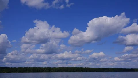 Time laps. Clouds flying across the sky on a summer day. Stock Footage 157590535