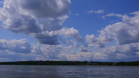 Time laps. Clouds flying across the sky on a summer day Stock Footage 157590537