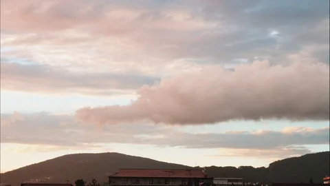 Time laps of clouds moving over mountains of Caucasus while sunset. Stock Footage 93799764