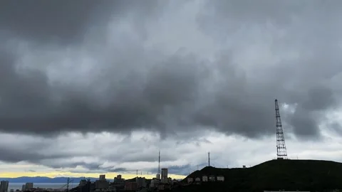 Time laps of clouds over the city before the rain Stock Footage 305071576