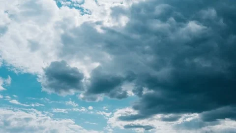 Time laps of epic storm clouds against a blue sky before a storm. Stock Footage 243611282