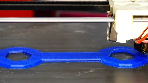 Time-laps filming of making a plastic wrench on a 3D printer Stock Footage 164921919