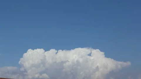 Time laps of fluffy White clouds at sunny day Stock Footage 236557971