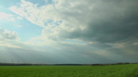 Time laps greenfield and white clouds Stock Footage 23218575