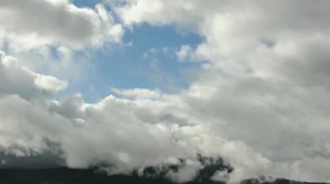 Time laps of moving clouds in mountains Stock Footage