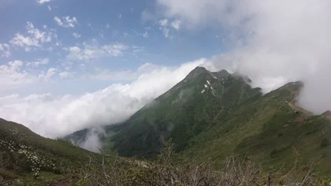 Time laps, moving clouds in the mountains Stock Footage 159759714
