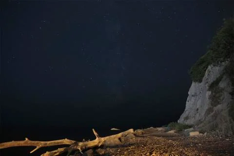 Time laps. The night sky over the black sea Stock Photos