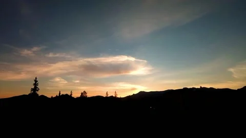 Time laps at sunrise . Movement of clouds . Sunset time-laps. Stock Footage 134890691