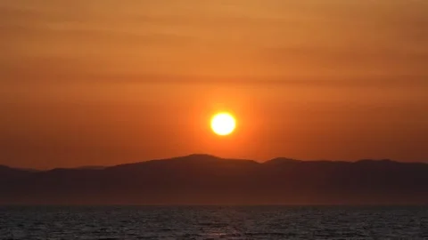 Time laps of sunset on the background of the seascape. Video stock 140946577