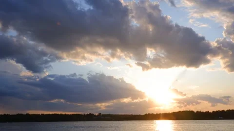 Time laps. Sunset in the clouds on the river in summer Stock Footage 157835238