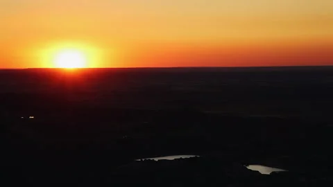 Time-laps: Sunset over a valley with two lakes Stock Footage 246314384