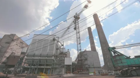 Time laps tower crane on a background of beautiful clouds. time laps of large Stock Footage 155852460