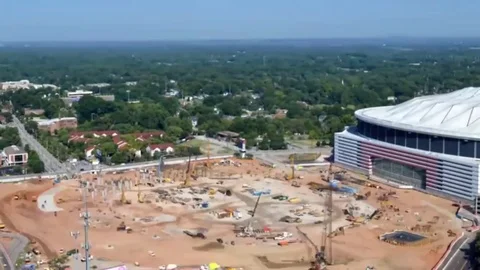 Time laps video showing the construction of mercedesbenz stadium at atlanta ( Stock Footage 101260536