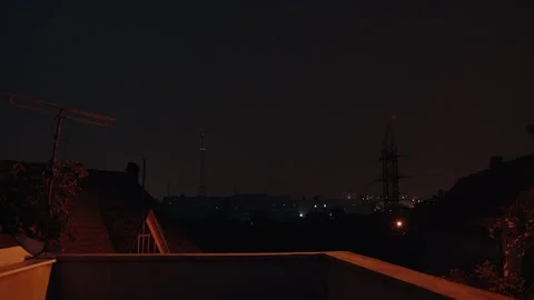 Time laps in the yard of a block during a strong storm. Strong lightning. Stock Footage 134702085