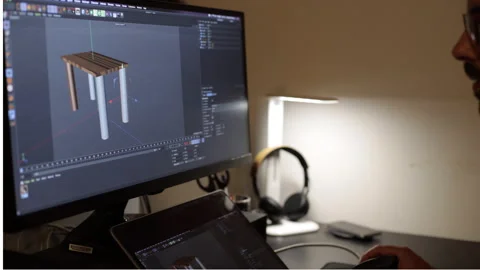 Time lapse: 3d designer works on a 3d model. Animated graphics rendering Stock Footage 135985039
